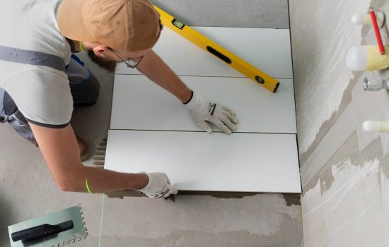 tiler-working-renovation-apartment